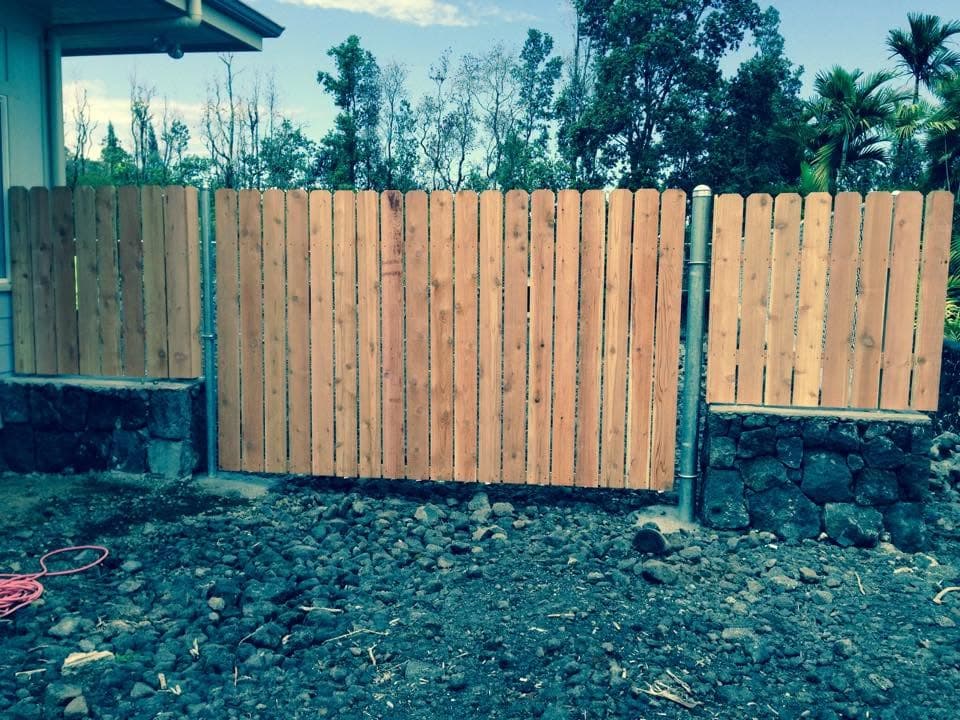 Wood dog-ear picket fence — On The Line Fencing project, Big Island, Hawaii