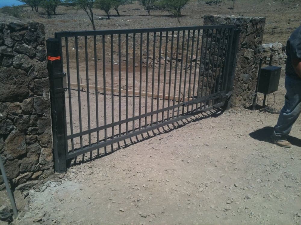 custom gates and solar openers from basic rach to the mosst extreme ornamental style that will fit your need — On The Line Fencing project, Big Island, Hawaii