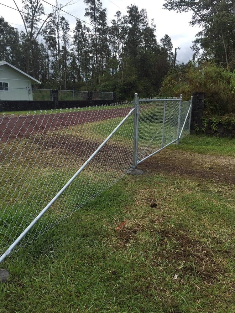 Residential front fence and gate installed by On The Line Fencing